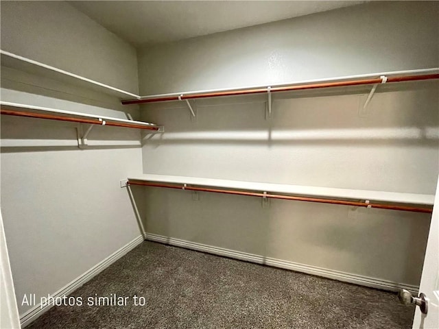 3371 N Apache St, Kingman, AZ 86401 - spacious closet featuring dark carpet
