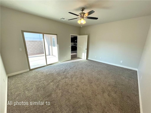 3371 N Apache St, Kingman, AZ 86401 - carpeted spare room featuring baseboards and ceiling fan