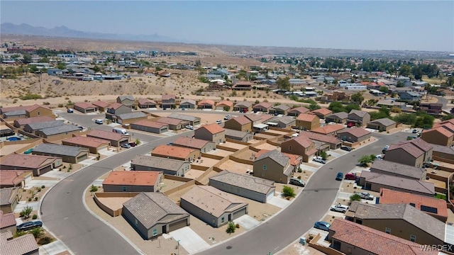 bird's eye view featuring a mountain view and a residential view