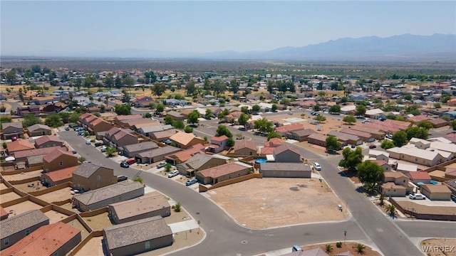 bird's eye view featuring a residential view and a mountain view