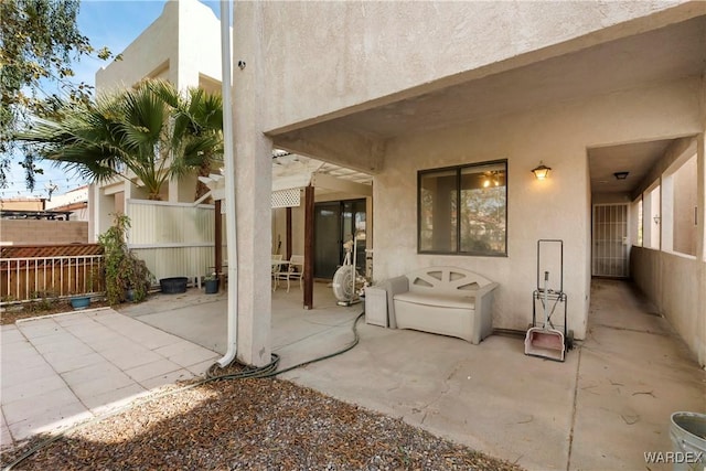 view of patio with fence