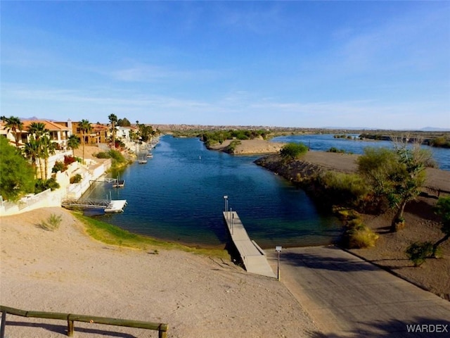 exterior space with a water view