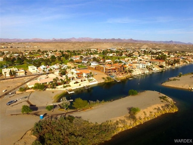 aerial view with a residential view and a water and mountain view