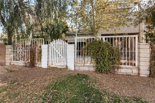 view of gate featuring fence