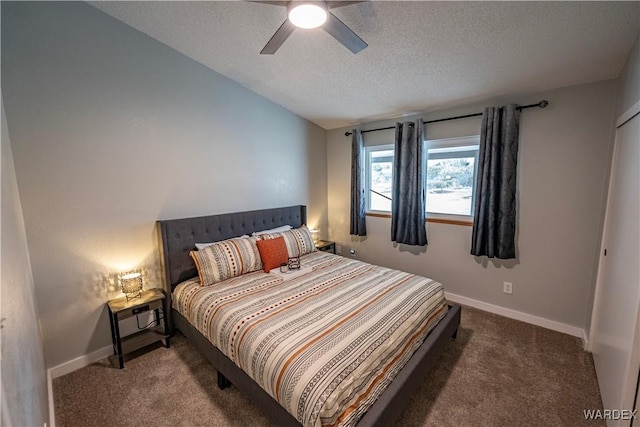 carpeted bedroom with a ceiling fan, vaulted ceiling, a textured ceiling, and baseboards