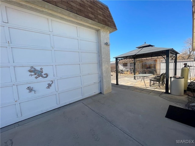 garage featuring fence