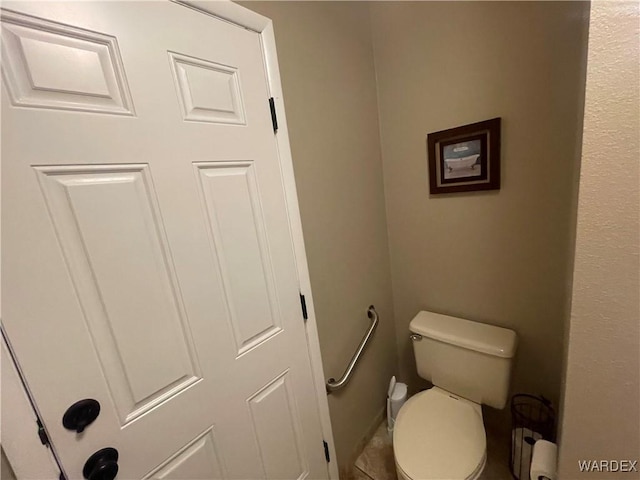 bathroom featuring toilet