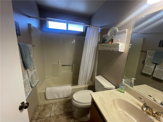 bathroom featuring toilet, shower / bath combo, and vanity