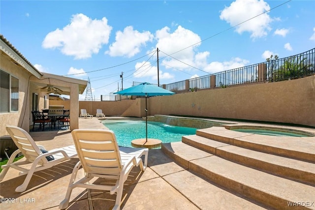 view of pool featuring a fenced backyard, a patio area, an in ground hot tub, outdoor dining space, and a fenced in pool