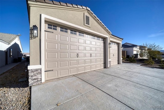 garage with driveway