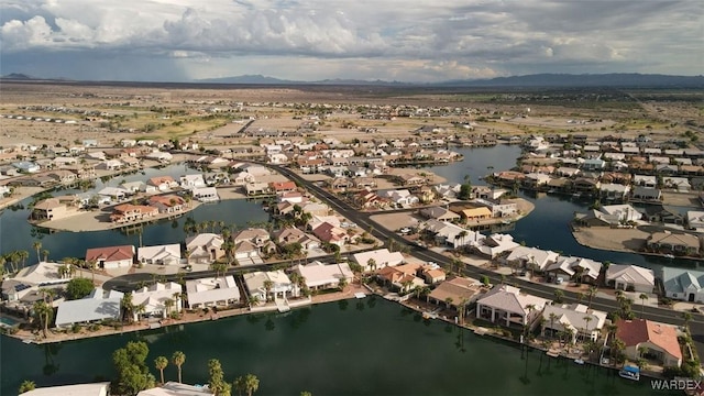 bird's eye view featuring a residential view and a water view