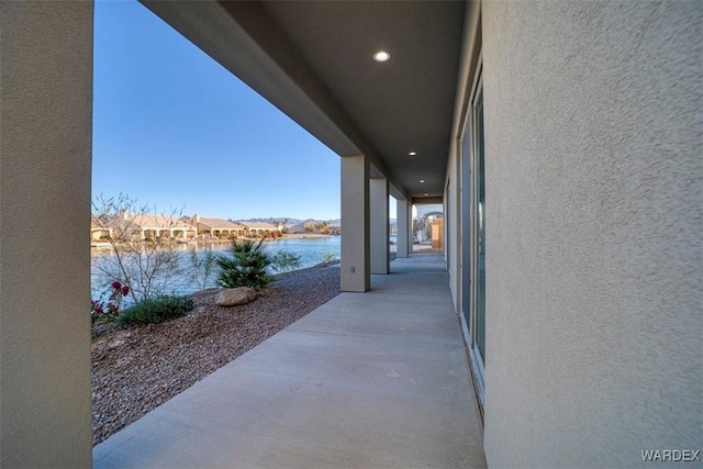 view of patio / terrace featuring a water view