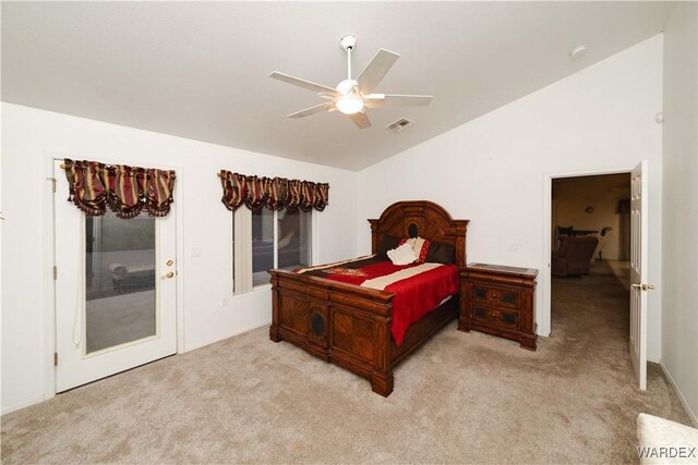 bedroom with lofted ceiling, ceiling fan, visible vents, and light colored carpet