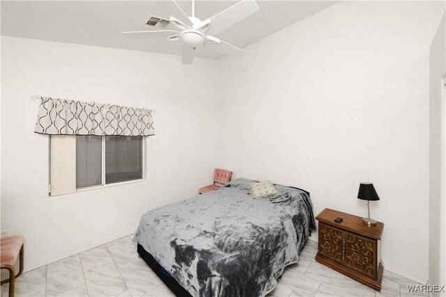 bedroom featuring marble finish floor, visible vents, ceiling fan, and baseboards