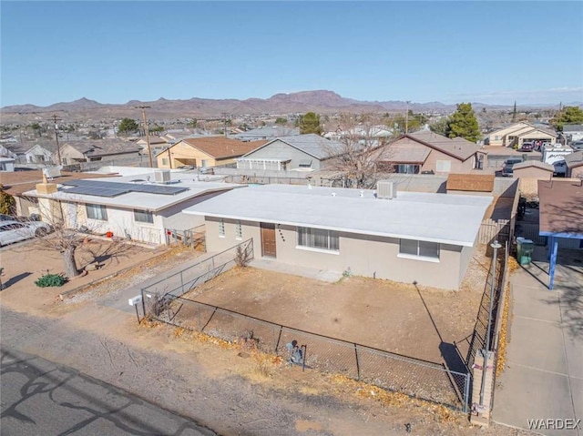 birds eye view of property featuring a residential view and a mountain view