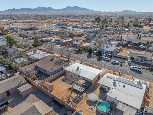 drone / aerial view with a residential view and a mountain view