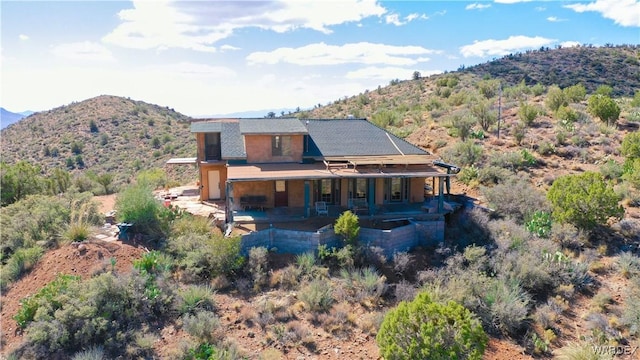 exterior space featuring a mountain view