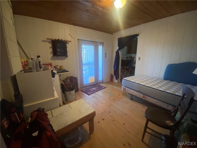 interior space featuring wooden ceiling and light wood-style floors