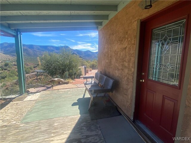 property entrance with a mountain view