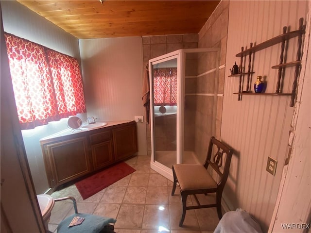 full bath with a stall shower, wooden ceiling, tile patterned flooring, and vanity