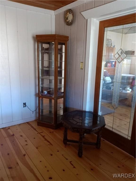 unfurnished dining area featuring wood finished floors