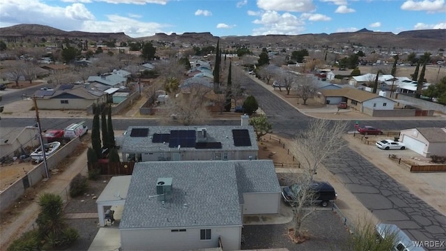 birds eye view of property featuring a residential view and a mountain view