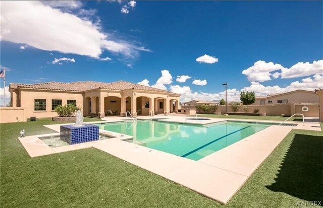 pool featuring a community hot tub, a yard, and a patio