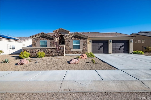 ranch-style house with a garage, driveway, stone siding, a tile roof, and stucco siding