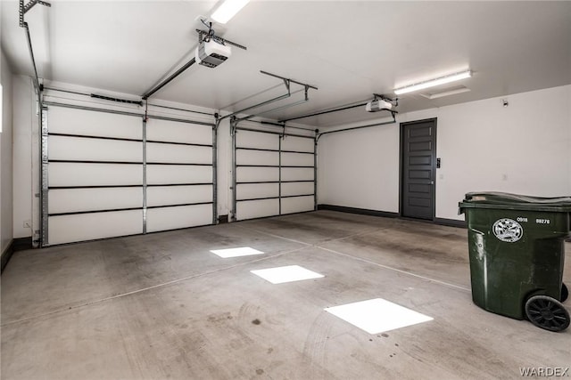 garage featuring a garage door opener