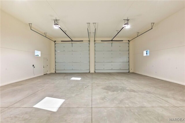 10726 S River Terrace Dr, Mohave Valley, AZ 86440 - garage with baseboards