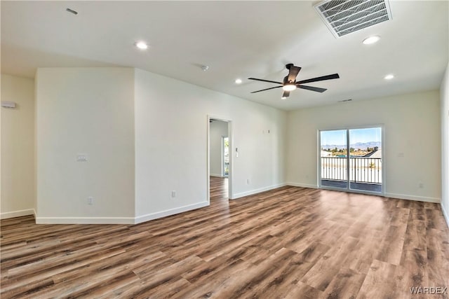 10726 S River Terrace Dr, Mohave Valley, AZ 86440 - empty room featuring ceiling fan, baseboards, wood finished floors, and recessed lighting