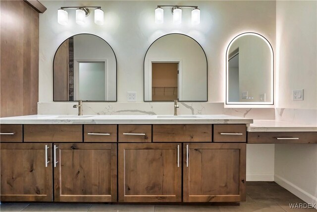 10726 S River Terrace Dr, Mohave Valley, AZ 86440 - full bathroom featuring double vanity and tile patterned flooring