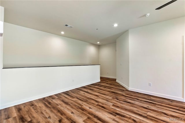 10726 S River Terrace Dr, Mohave Valley, AZ 86440 - empty room featuring wood finished floors, baseboards, recessed lighting, and a smoke detector