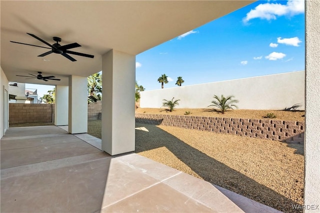 10726 S River Terrace Dr, Mohave Valley, AZ 86440 - view of patio featuring a ceiling fan and a fenced backyard