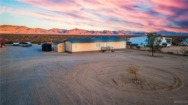 single story home with a mountain view