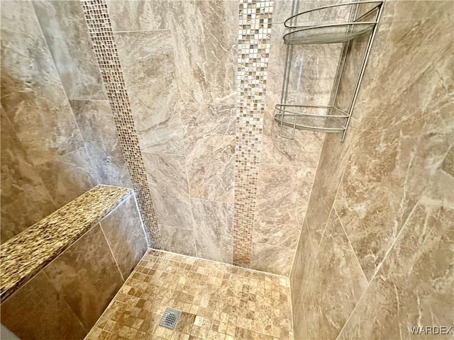 details with a tile shower
