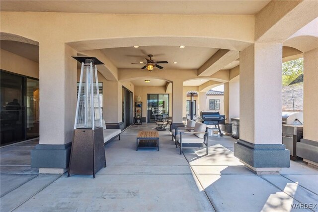 view of patio / terrace with outdoor dining space, outdoor lounge area, and grilling area