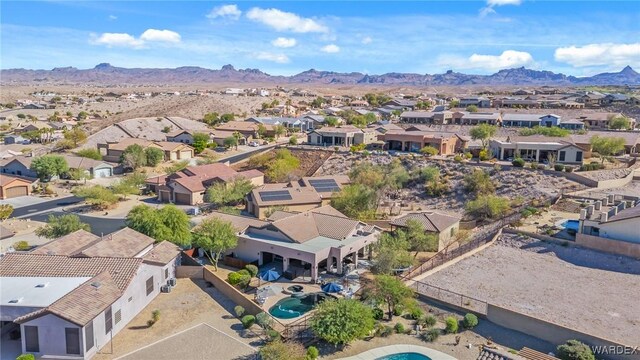 bird's eye view with a residential view and a mountain view