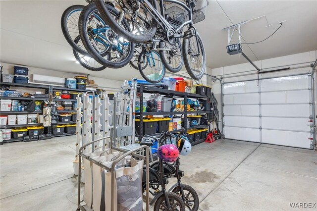 garage featuring a garage door opener