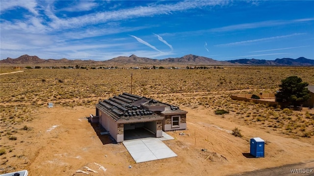 view of mountain feature with a rural view and view of desert