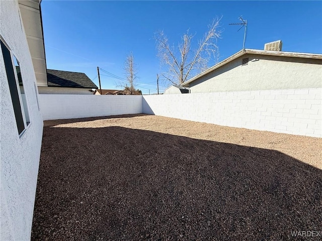 view of yard featuring a fenced backyard