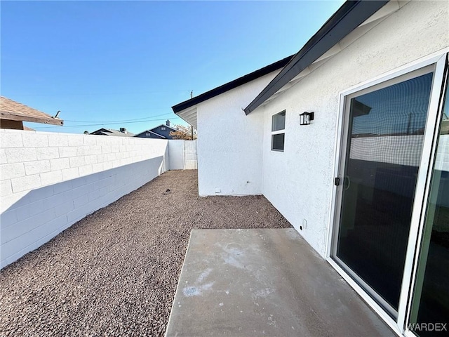 view of yard with a patio area and a fenced backyard