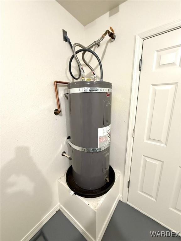 utility room with water heater