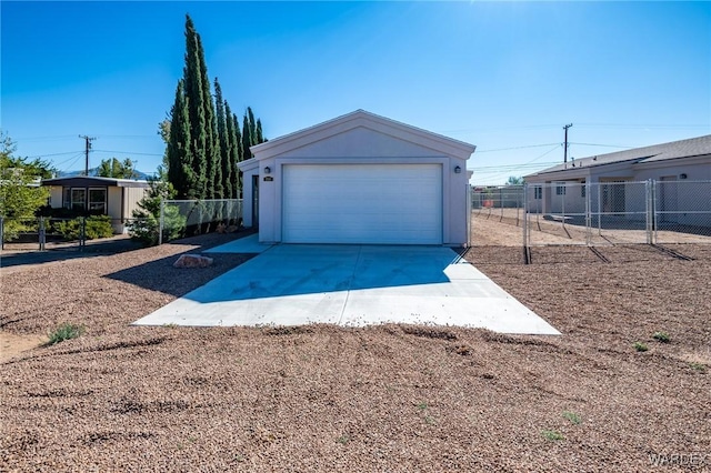 garage with fence