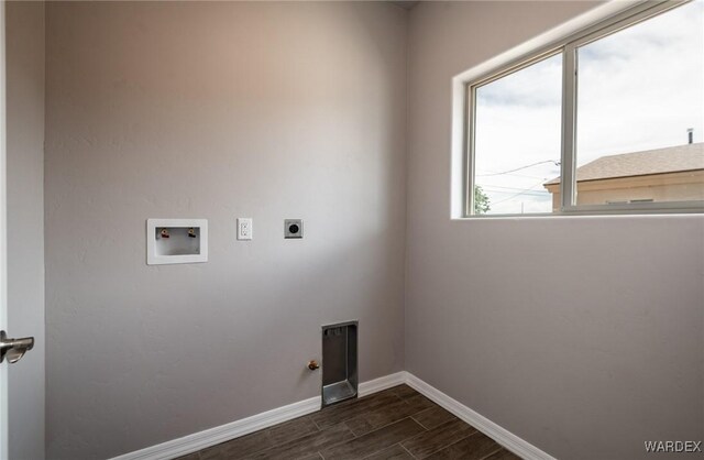 washroom with hookup for a washing machine, laundry area, baseboards, wood tiled floor, and electric dryer hookup