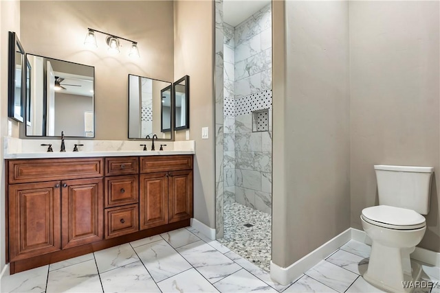 full bathroom with toilet, marble finish floor, walk in shower, and a sink