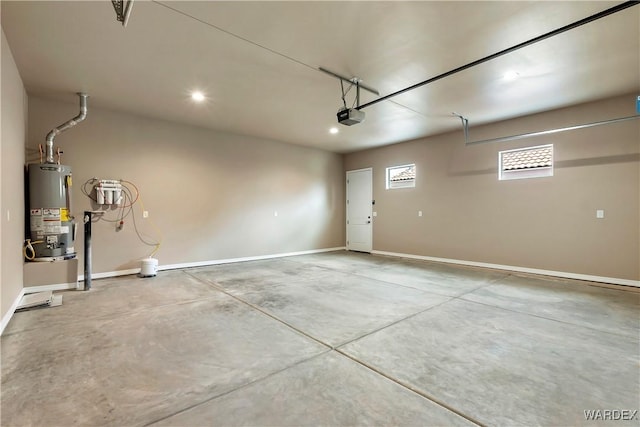 garage with water heater, recessed lighting, baseboards, and a garage door opener