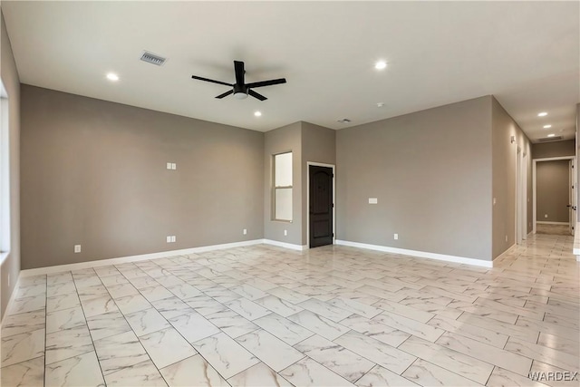 empty room featuring recessed lighting, visible vents, a ceiling fan, baseboards, and marble finish floor