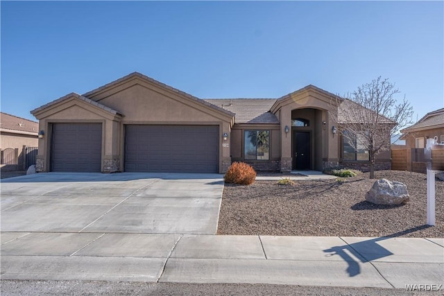 ranch-style home with a garage, stone siding, driveway, and stucco siding