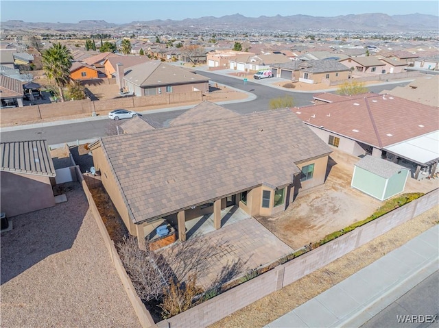 aerial view with a mountain view and a residential view